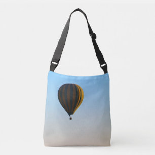 Air balloon in blue sky crossbody bag