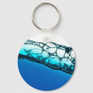 Air bubbles in blue water keychain