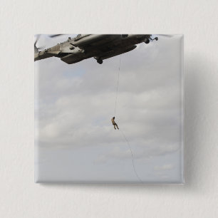 Air Force pararescuemen conduct a combat insert 2 Inch Square Button