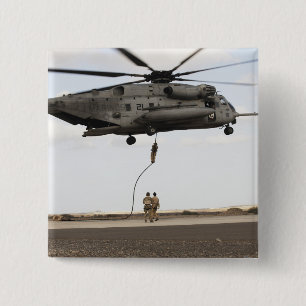 Air Force pararescuemen conduct a combat insert 3 2 Inch Square Button