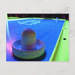 Air Hockey table and mallet with neon lighting Postcard
