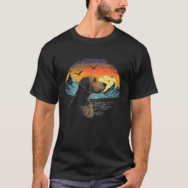 Airedale Terrier Dog and Sun Rising Over Mountains T-Shirt (Front)