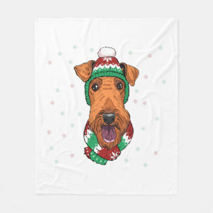 Airedale Terrier in christmas hat Fleece Blanket