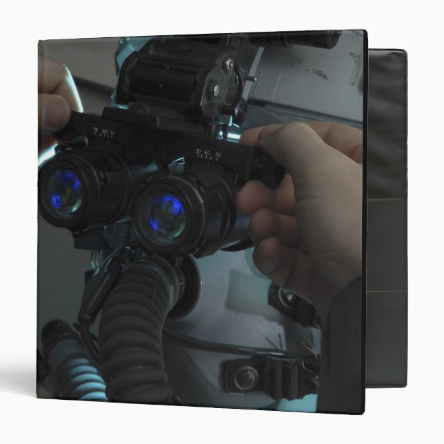 Airman adjusts the eyespan binder (Front/Inside)