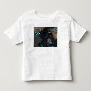 Airman adjusts the eyespan toddler t-shirt