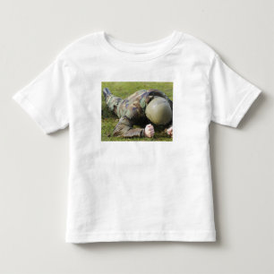 Airman crawls through a wet field toddler t-shirt