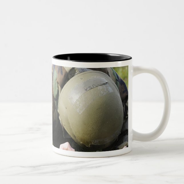 Airman crawls through a wet field Two-Tone coffee mug (Right)