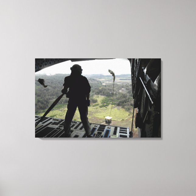 Airman watches a practice bundle fall canvas print (Front)