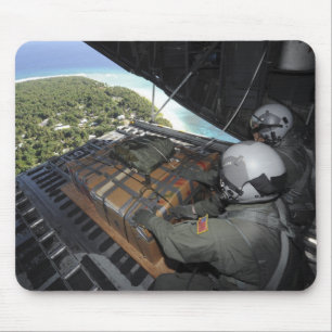 Airmen push out a pallet of donated goods 2 mouse pad