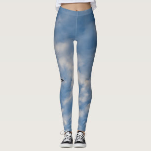 Airplane Crossing a Cloud-Filled Blue Sky Leggings
