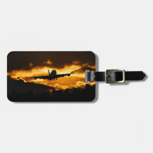 Airplane Flying at Sunset Luggage Tag