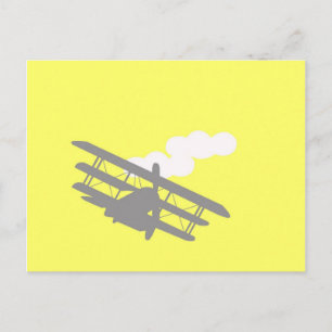 Airplane on plain yellow background. postcard