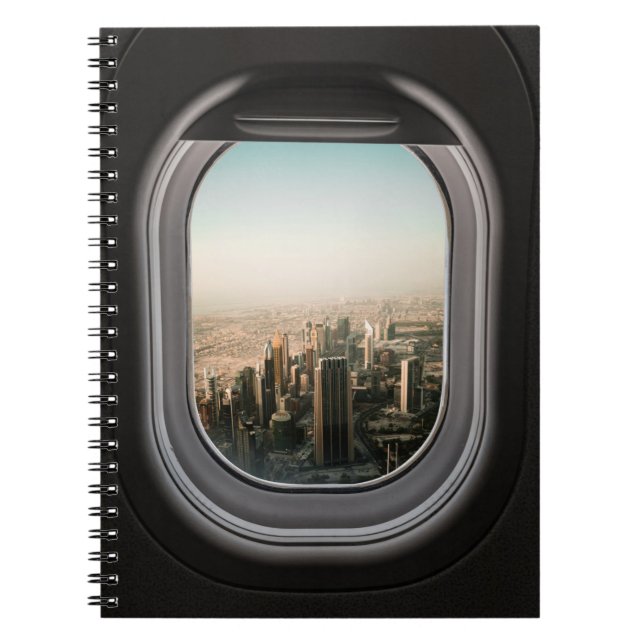 AIRPLANE WINDOW VIEW OF CITY DURING DAYTIME NOTEBOOK (Front)