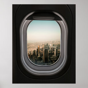 AIRPLANE WINDOW VIEW OF CITY DURING DAYTIME POSTER