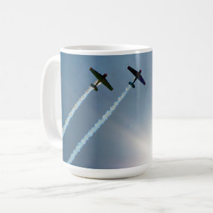 Airplanes Flying on Blue Sky with Sun. Coffee Mug