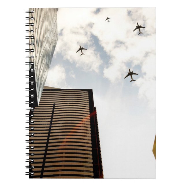 Airplanes flying over buildings notebook (Front)