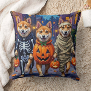 Akita Dogs Trick-or-Treating in Halloween Costumes Throw Pillow
