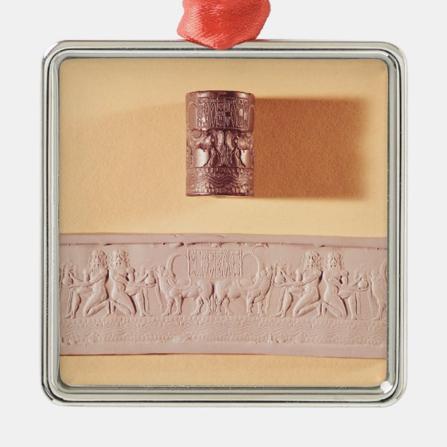 Akkadian cylinder seal and impression metal ornament (Front)