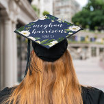 Alabaster Floral | Custom Name and Class Year Graduation Cap Topper<br><div class="desc">Stand out in the crowd! This beautiful grad cap topper features the graduate's name in elegant white calligraphy script,  on a classic navy blue background adorned with white watercolor flowers and green foliage. Personalize with your class year and/or school beneath.</div>