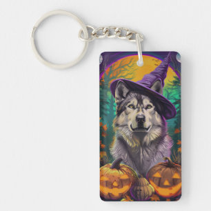 Alaskan Malamute Halloween sorcière et Citrouille