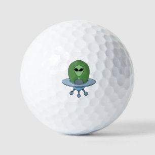 Alien in his little spaceship golf balls