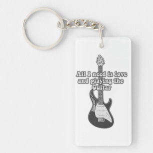 All i need is love and playing the guitar. B & W Keychain