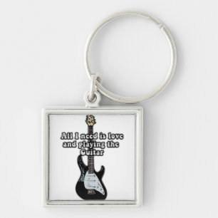All i need is love and playing the guitar. keychain