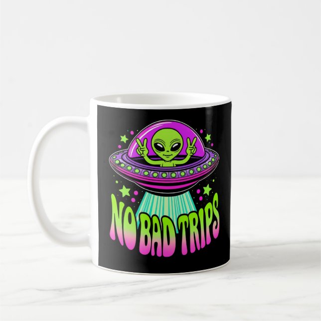 allen in a flying saucer coffee mug (Left)