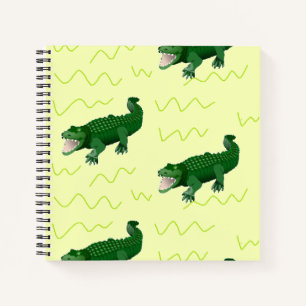 Alligator on yellow notebook