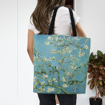 Almond Blossoms | Vincent Van Gogh Tote Bag<br><div class="desc">Almond Blossoms (1890) by Dutch artist Vincent van Gogh (1853-1890). Van Gogh's Almond Blossoms painting showcases delicate white flowers set against a vibrant turquoise sky, symbolizing new life and renewal. Inspired by Japanese art, the elegant branches and flowing lines create a sense of serenity and natural beauty. The textured brushstrokes...</div>