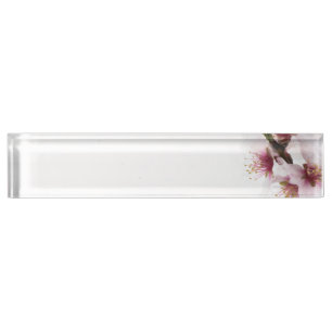 Almond tree flowers covered by snow nameplate