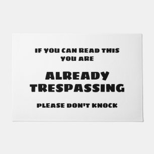 ALREADY TRESPASSING Door Mat