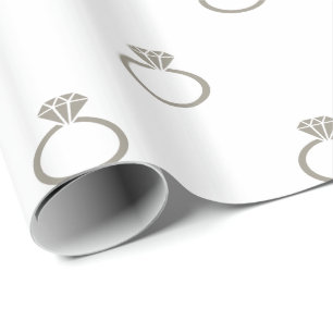 Aluminum Silver Grey Engagement Rings on White Wrapping Paper