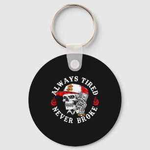 Always Tired Never Broke Funny Skull (on Back)  Keychain