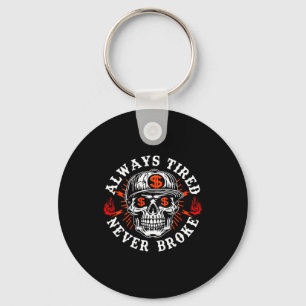 Always Tired Never Broke Funny Skull (on Back)  Keychain