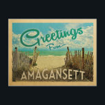 Amagansett Beach Vintage Travel Postcard<br><div class="desc">This Greetings From Amagansett vintage postcard design features a sandy beach with a beautiful turquoise ocean water and above the sea,  a blue sky with billowy white clouds. In vintage travels style.</div>