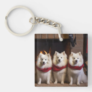 American Eskimo by the Fireplace Christmas Keychain
