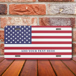 American Flag Add Your Custom Text License Plate<br><div class="desc">Add a text, and easily create your personalized license plate. Click CUSTOMIZE to change the text color. You can TRANSFER this DESIGN on other Zazzle products and adjust it to fit most of the Zazzle items. Standard Studio designs are made in high-resolution vector graphics for a professional print. Thank you...</div>