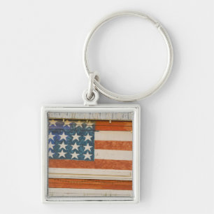American flag painted onto fireworks stand near keychain