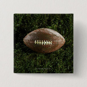 American football on grass, view from above 2 inch square button