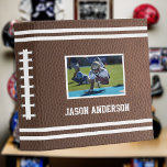 American Football Sport Fan Photo Scrapbook Binder<br><div class="desc">Enjoy this really customizable American football themed scrapbook album! Personalize with a photo and name on front, and jersey number on back. Brown photo leather background with double white stripes across top and bottom, and laced spine. PLEASE NOTE! - Use a HORIZONTAL photo on THIS album. And, I also have...</div>