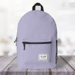 American Nostalgia Classic Simple Minimal Lilac Printed Backpack<br><div class="desc">This american nostalgia style classic backpack in lilac purple features a patch style emblem with a monogram name and framed border,  featuring informal handwritten script and modern block typography. The text can be customized with your name for a design as unique as you are!</div>
