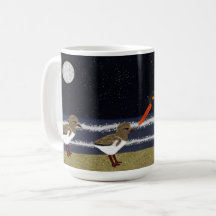 American Oystercatcher with chicks at night 