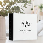 Ampersand Monogram Wedding Binder<br><div class="desc">Use this chic monogrammed binder to organize your wedding plans, or as a DIY wedding album or scrapbook. Timeless black and white design features your initials joined by an oversized script ampersand, with two lines of custom text beneath. Personalize the crisp black spine with additional custom text in white.</div>