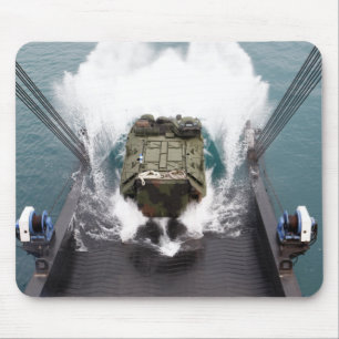 Amphibious assault vehicles disembark from USNS Mouse Pad