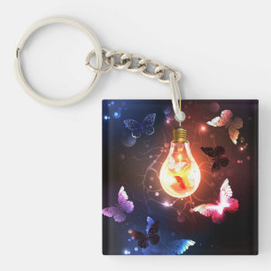 Ampoule lumineuse avec papillons nocturnes