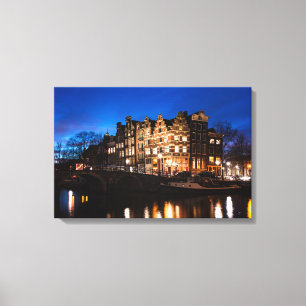Amsterdam canal houses at night canvas print