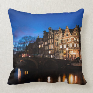 Amsterdam canal houses at night throw pillow
