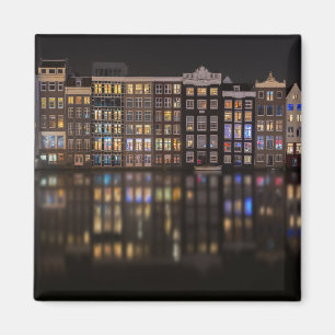 Amsterdam houses with colourful lights in the nigh magnet