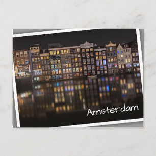 Amsterdam houses with colourful lights in the postcard